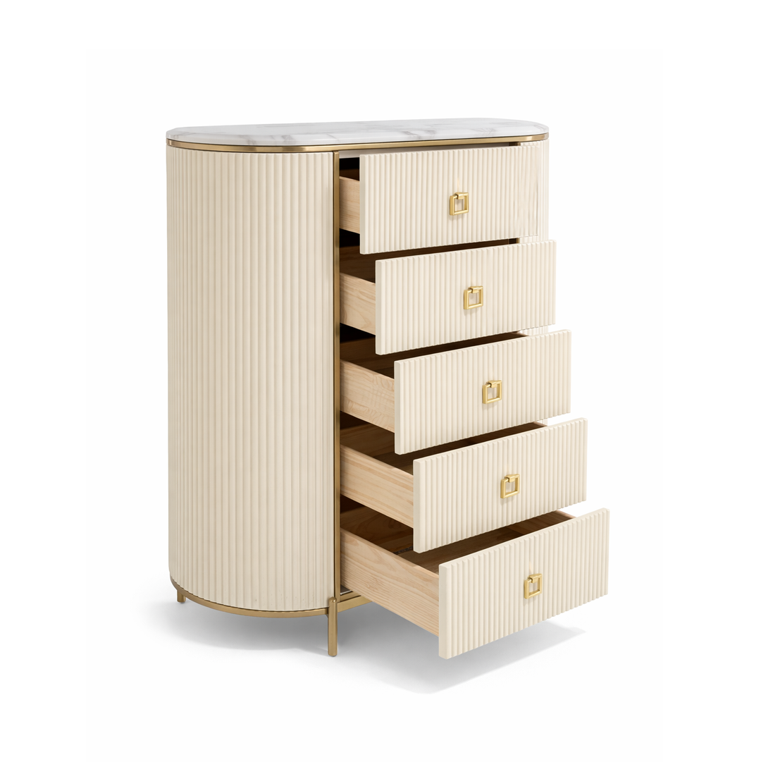 Cream fluted storage chest with marble top, gold trim, and five open drawers showing light wood interiors and gold handles.