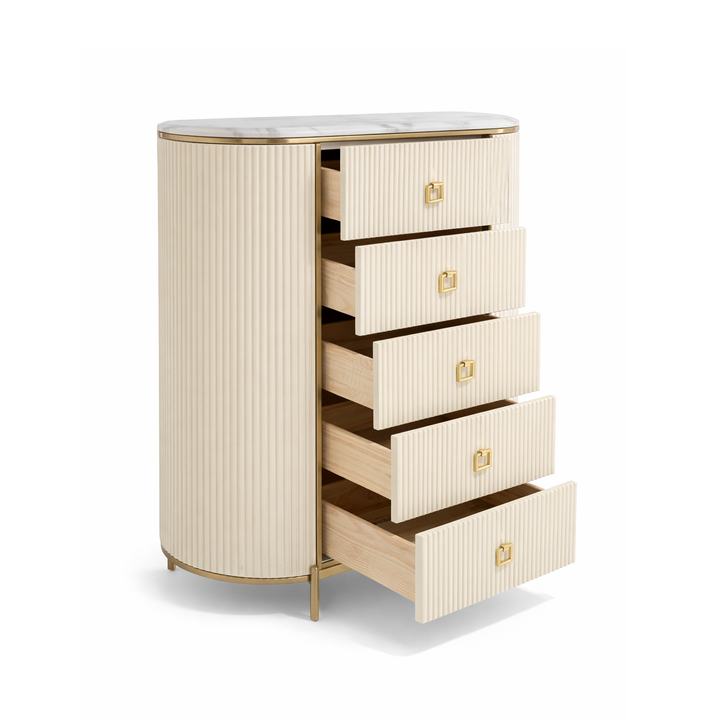 Cream fluted storage chest with marble top, gold trim, and five open drawers showing light wood interiors and gold handles.