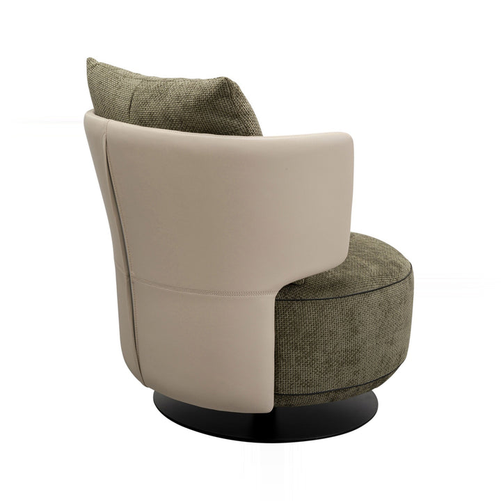 An accent chair on a white background. The chair features a cream-colored back and armrests with a green textured seat and back pillow, with a black base.