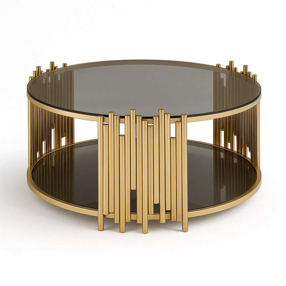 Round coffee table with smoked glass top and lower shelf supported by vertical gold metal bars.