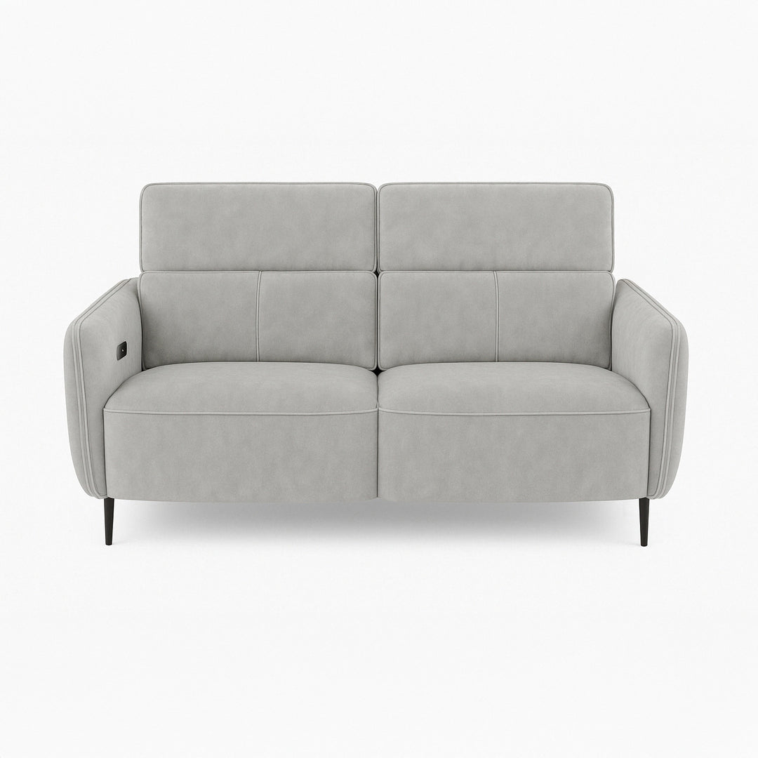 A light gray two-seater sofa with a modern design sits against a plain white background. It has a slightly elevated backrest and sleek, minimalist black legs.