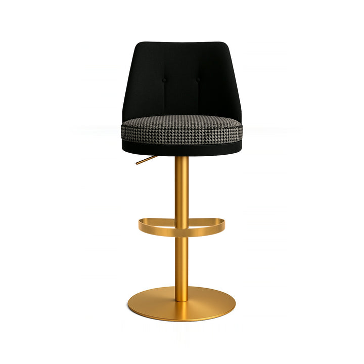 A black and houndstooth barstool with a gold base is displayed on a white background.