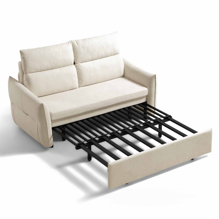 Cream-colored sofa bed with the pull-out bed partially extended, set against a white background. The sofa features cushioned backrests and armrests. The exposed metal frame of the pull-out bed is visible.