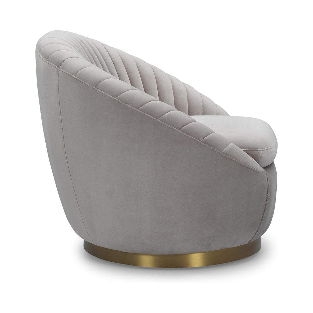 Light grey Shell Velvet Accent Chair featuring channel tufting and a gold swivel base.