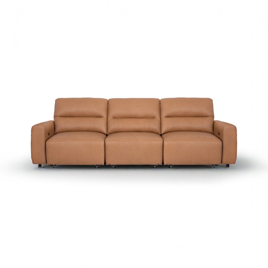 Three-seater tan leather recliner sofa isolated on a white background.