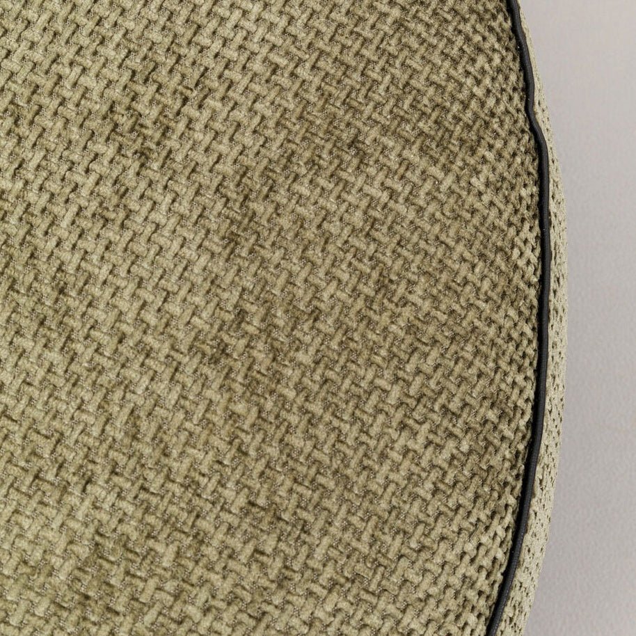 Close-up detail of the textured polyester fabric used for an accent chair, showcasing the weave and edging.