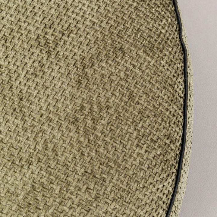 Close-up detail of the textured polyester fabric used for an accent chair, showcasing the weave and edging.