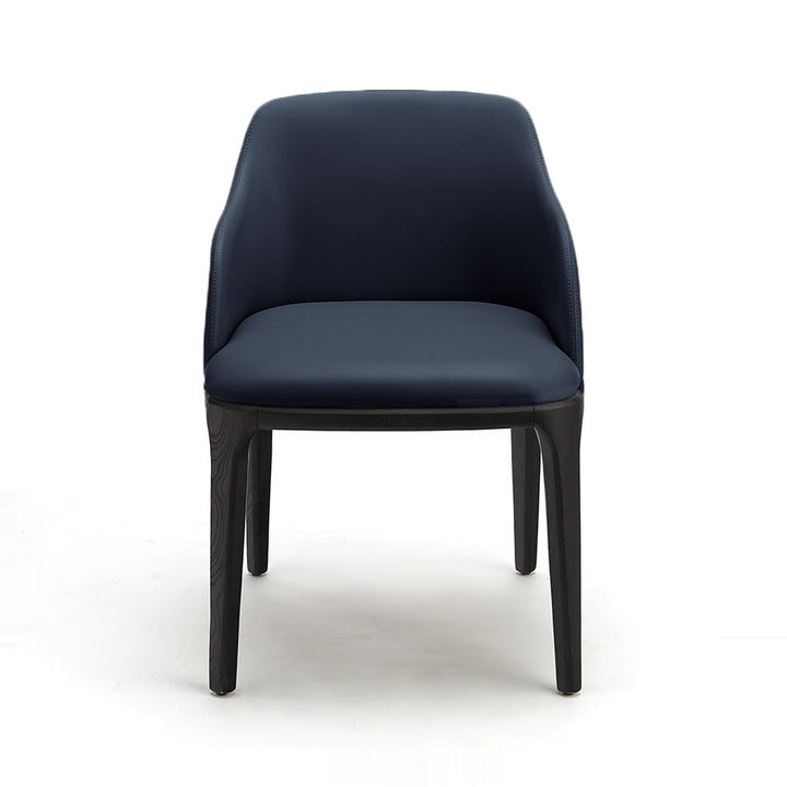 A modern navy blue upholstered chair with dark wood legs on a white background.