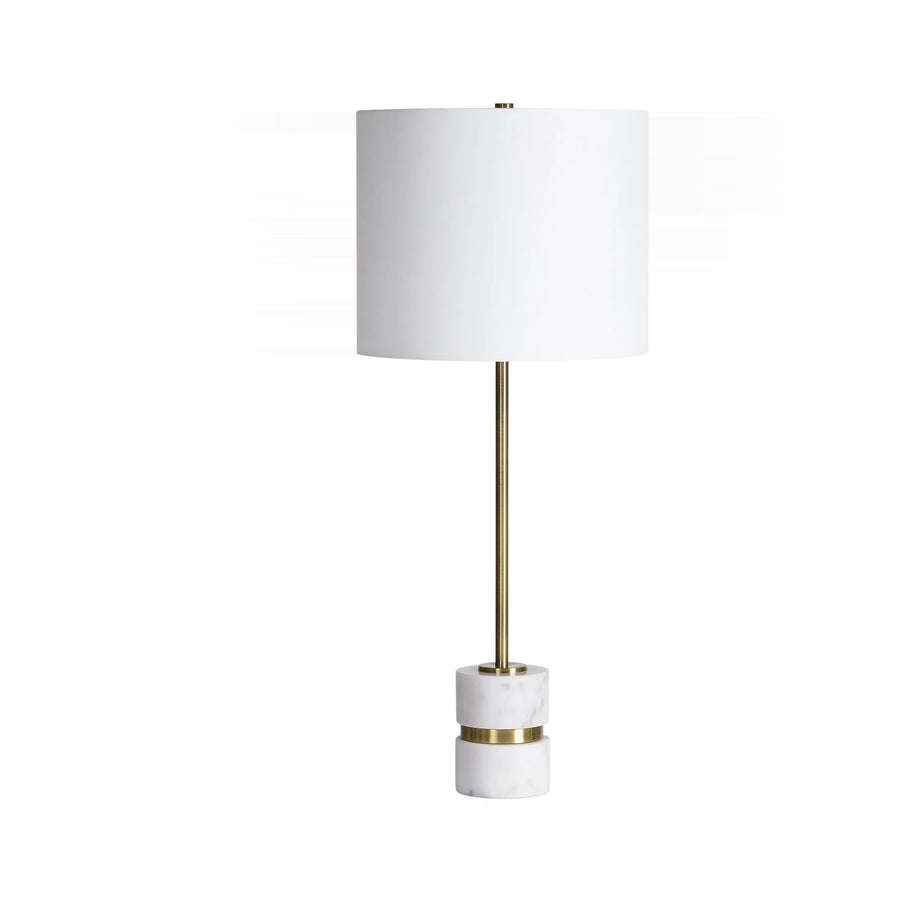 A white and gold table lamp features a marble base, a gold metal stem, and a white lampshade, displayed on a white background.