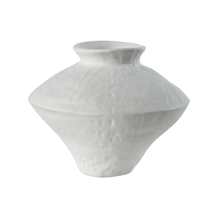 A white ceramic vase with a textured surface, set against a white background.