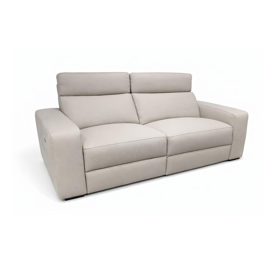 Modern beige leather sofa with wide armrests, dual seat cushions, and a sleek minimalist design.