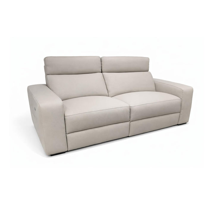 Modern beige leather sofa with wide armrests, dual seat cushions, and a sleek minimalist design.
