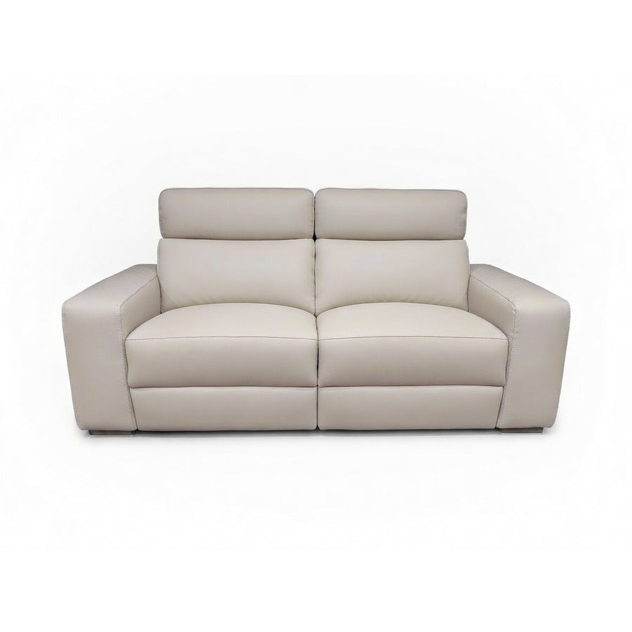 Beige leather two-seater sofa with separate headrests and plush cushions.