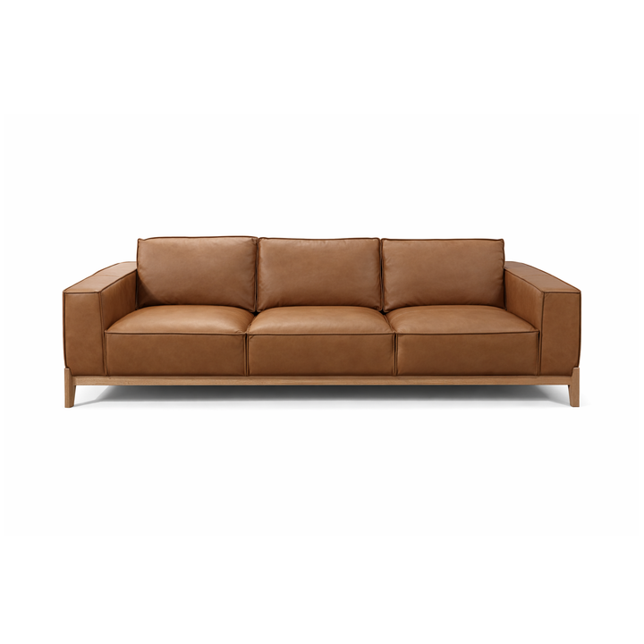 Cognac leather three-seater sofa with light wood frame and tapered legs