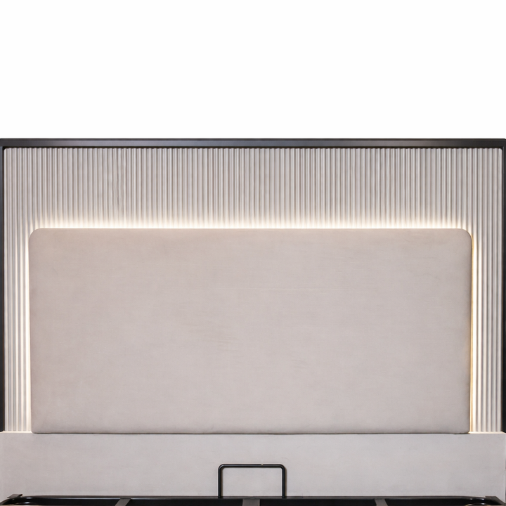 QUILL Rounded Corners LED Bed headboard with beige velvet panel, fluted background, and warm LED strip lighting in a black frame.