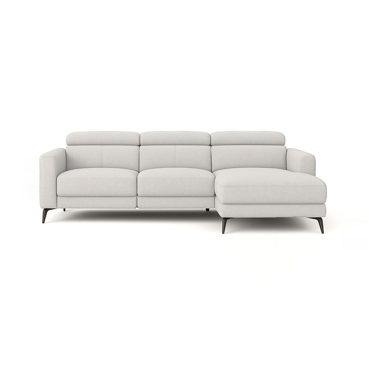 A white chaise sectional sofa is displayed on a white background.