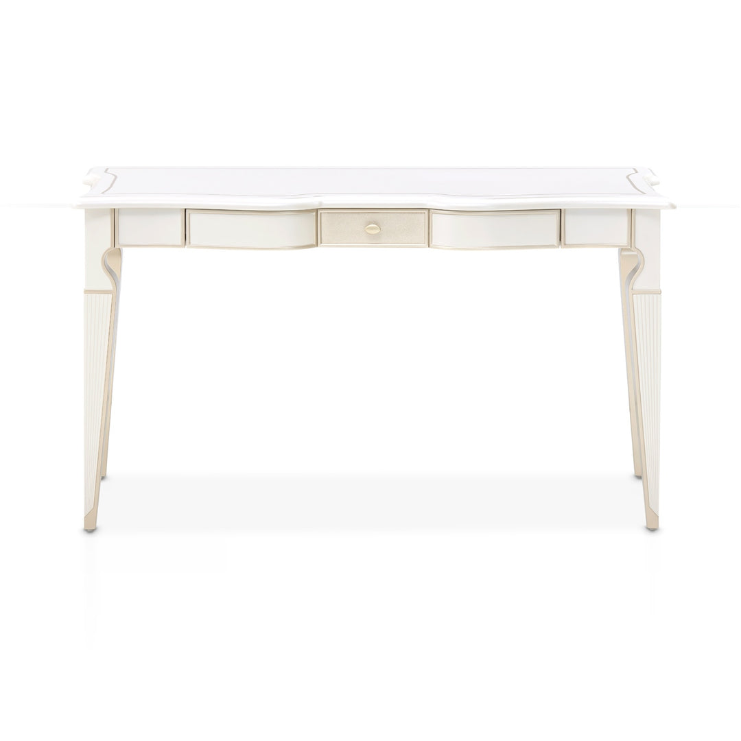 A white and gold desk with three drawers is featured on a white background.