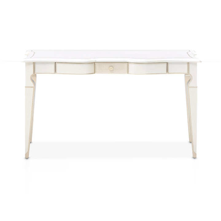 A white and gold desk with three drawers is featured on a white background.