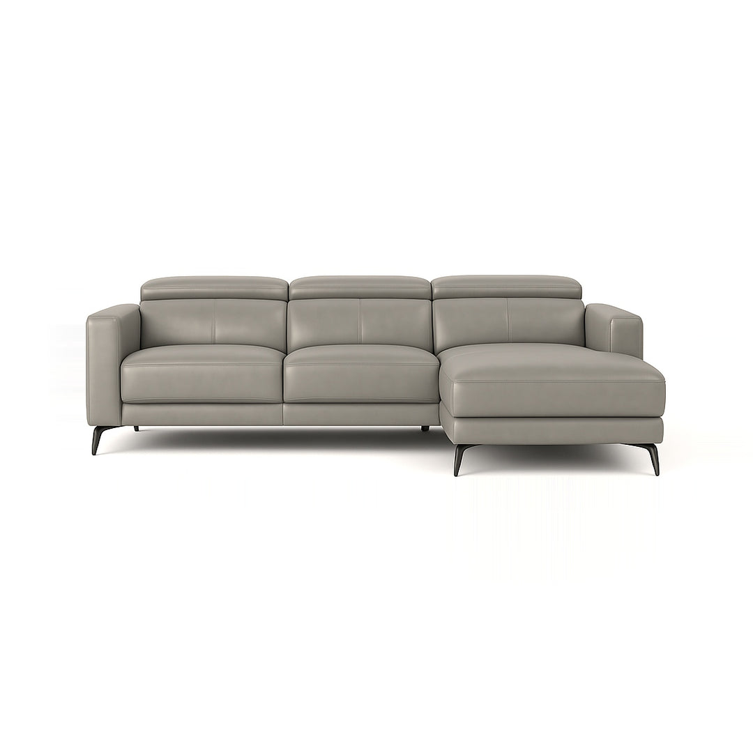 A gray leather sectional sofa with a chaise lounge, photographed on a white background.