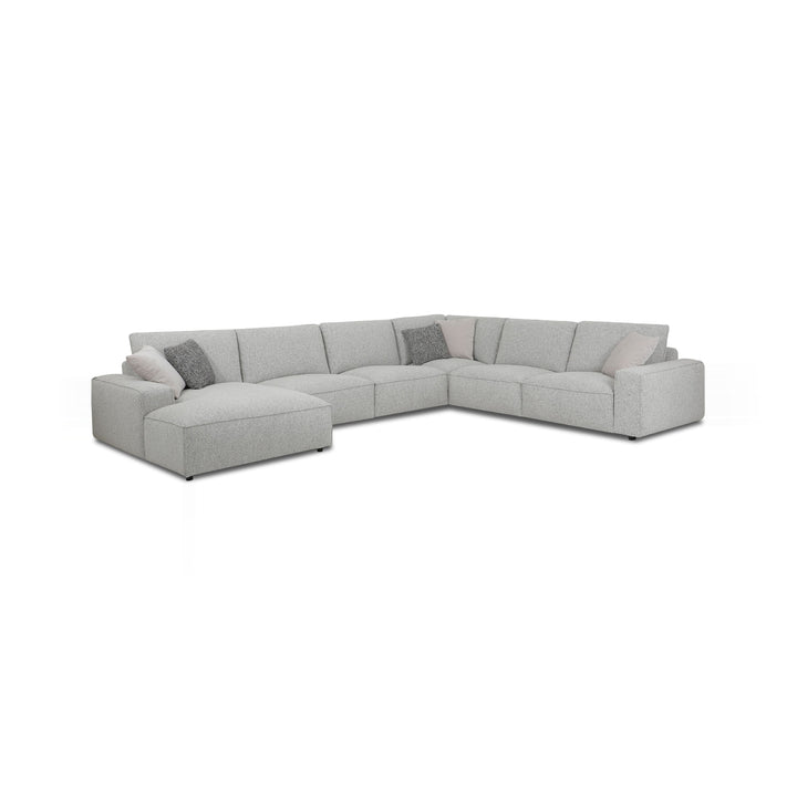 Large sectional sofa with light gray upholstery and decorative pillows on a white background.
