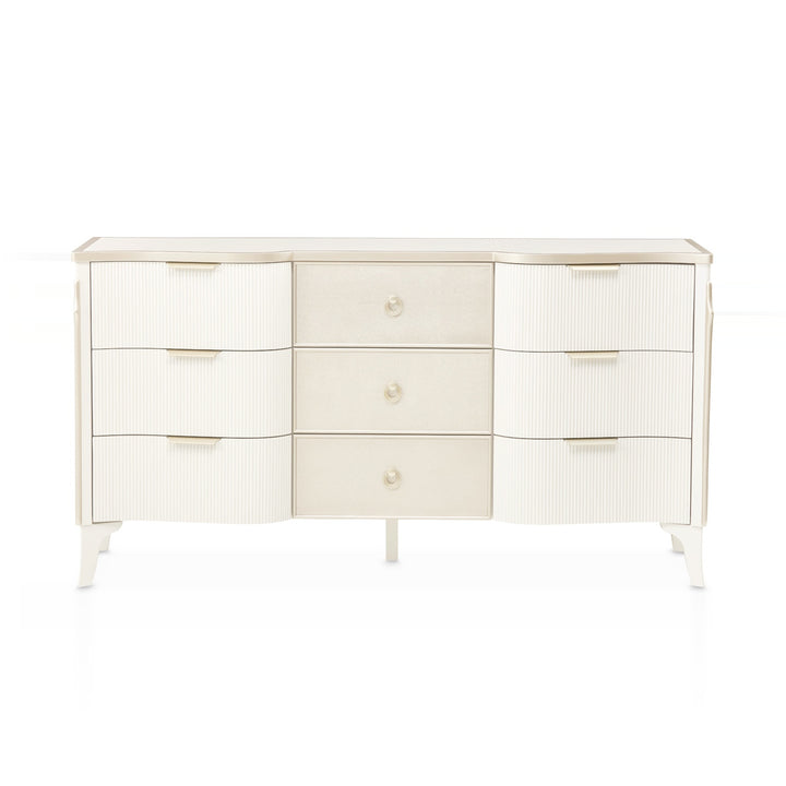 A white dresser with three drawers on each side and three drawers in the center, all on a white background.