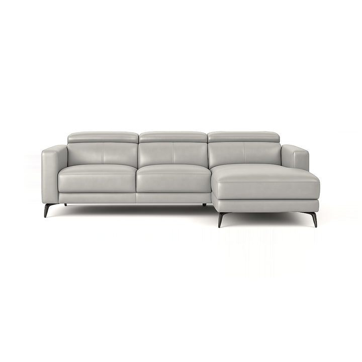 A light gray leather sectional sofa with a chaise lounge on a white background.