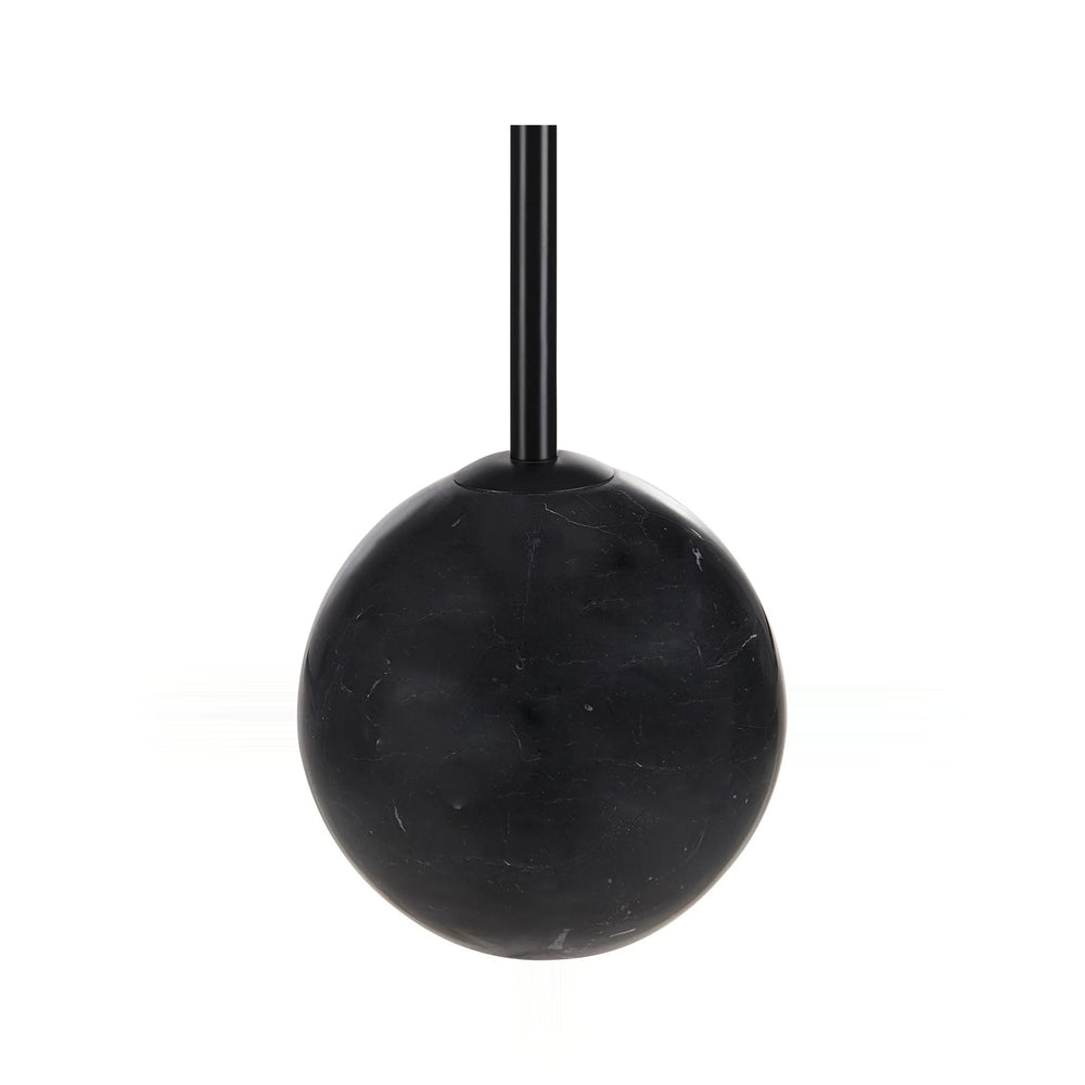 A close-up image of a black marble lamp base with a black steel stem, set against a white background.