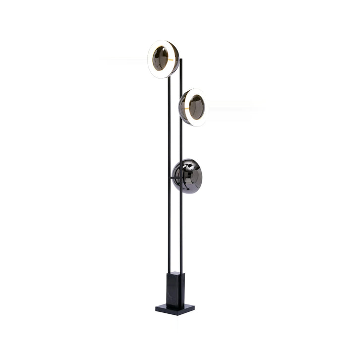 A modern floor lamp with three circular lights and a black base isolated on a white background.