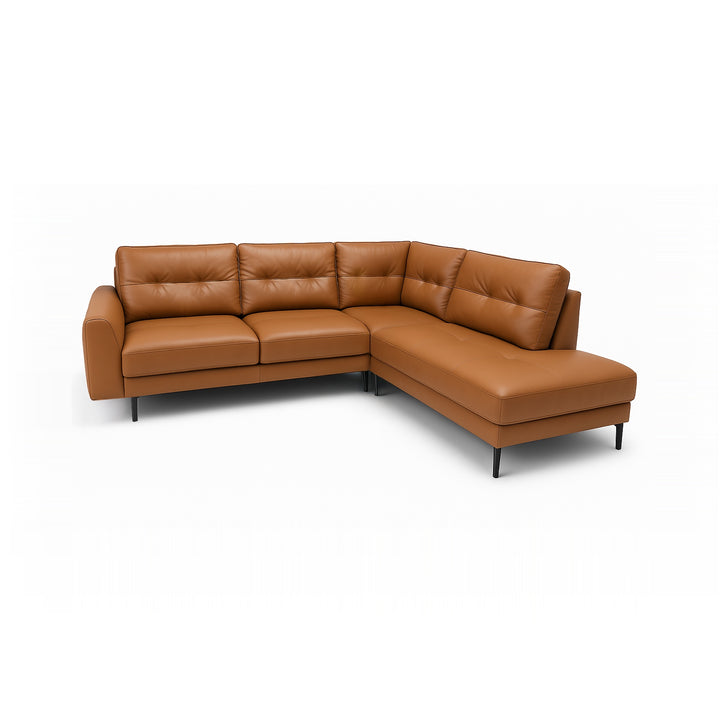 A caramel-colored leather sectional sofa with a chaise lounge on a white background.