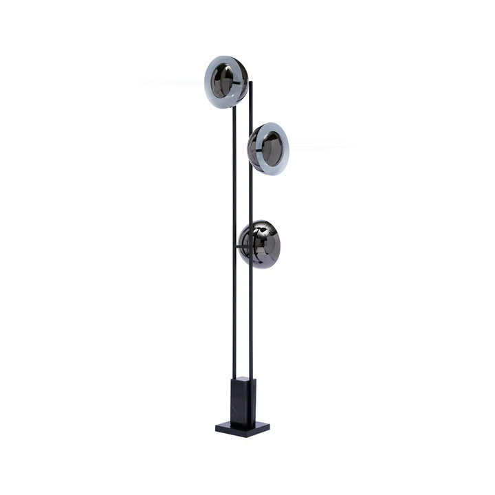 Modern floor lamp with black metal frame and three spherical glass shades on a white background.
