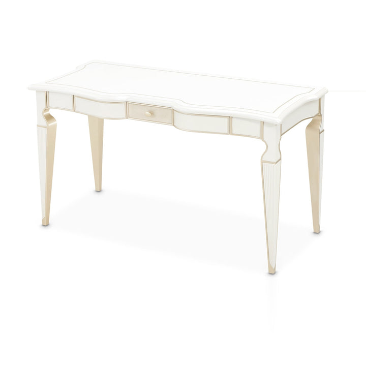 A cream-colored desk with gold accents is displayed on a white background.