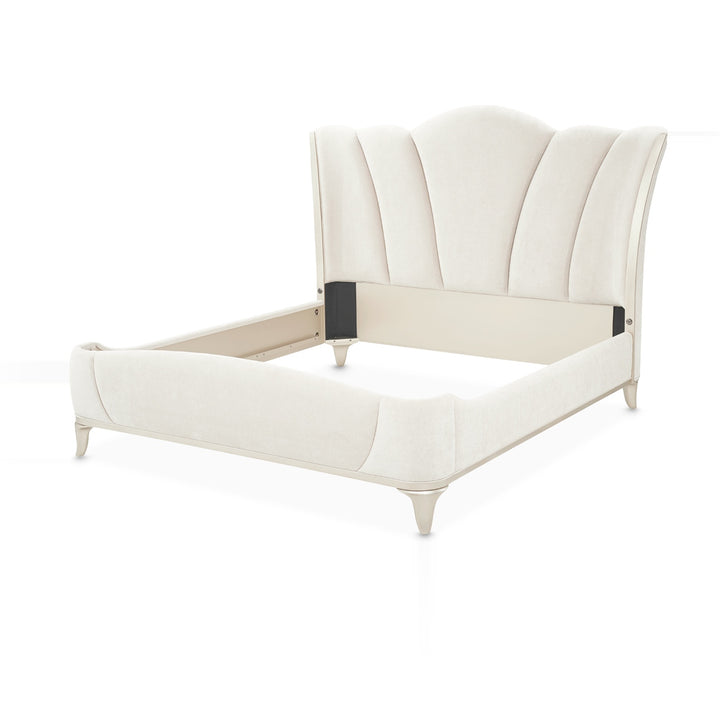A white upholstered bed frame with an art deco-inspired headboard, presented on a clean white background.