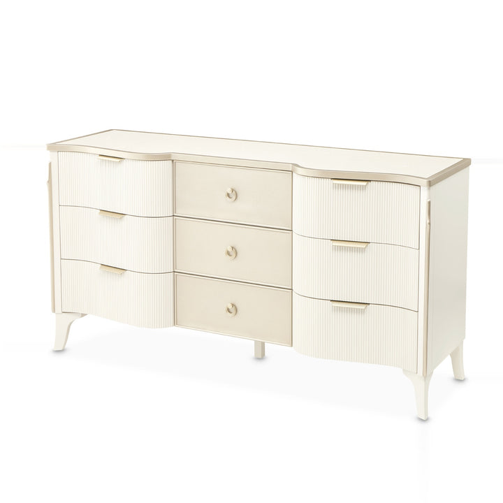 A white and gold dresser with six drawers is displayed on a white background.